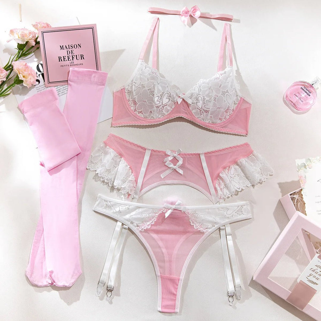 Elegant lace lingerie set consisting of a bra, high waisted garter belt and panties