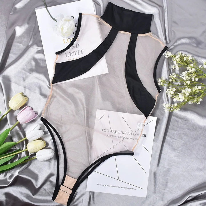 Sheer high neck bodysuit with black details and bold cutouts